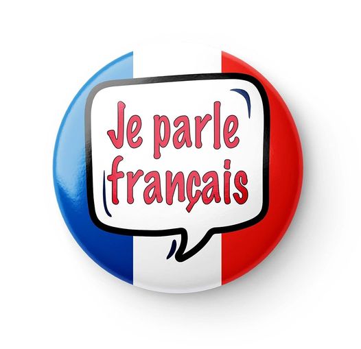 Peut être une image de bouton, drapeau et texte qui dit ’Je parle français’